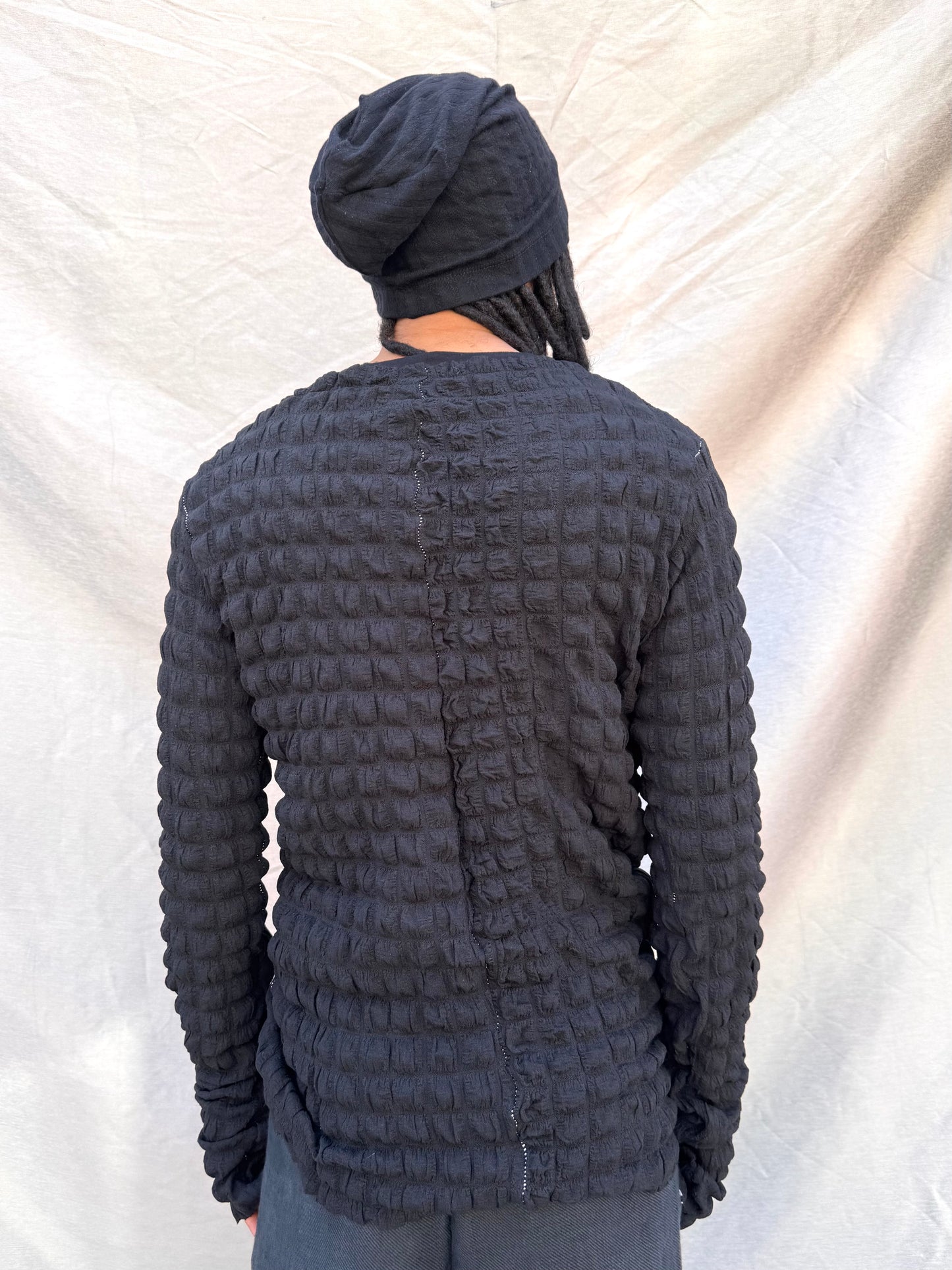 SS25 || OVERLOCKED PRIMORIDAL BUBBLE TEE || BLACK
