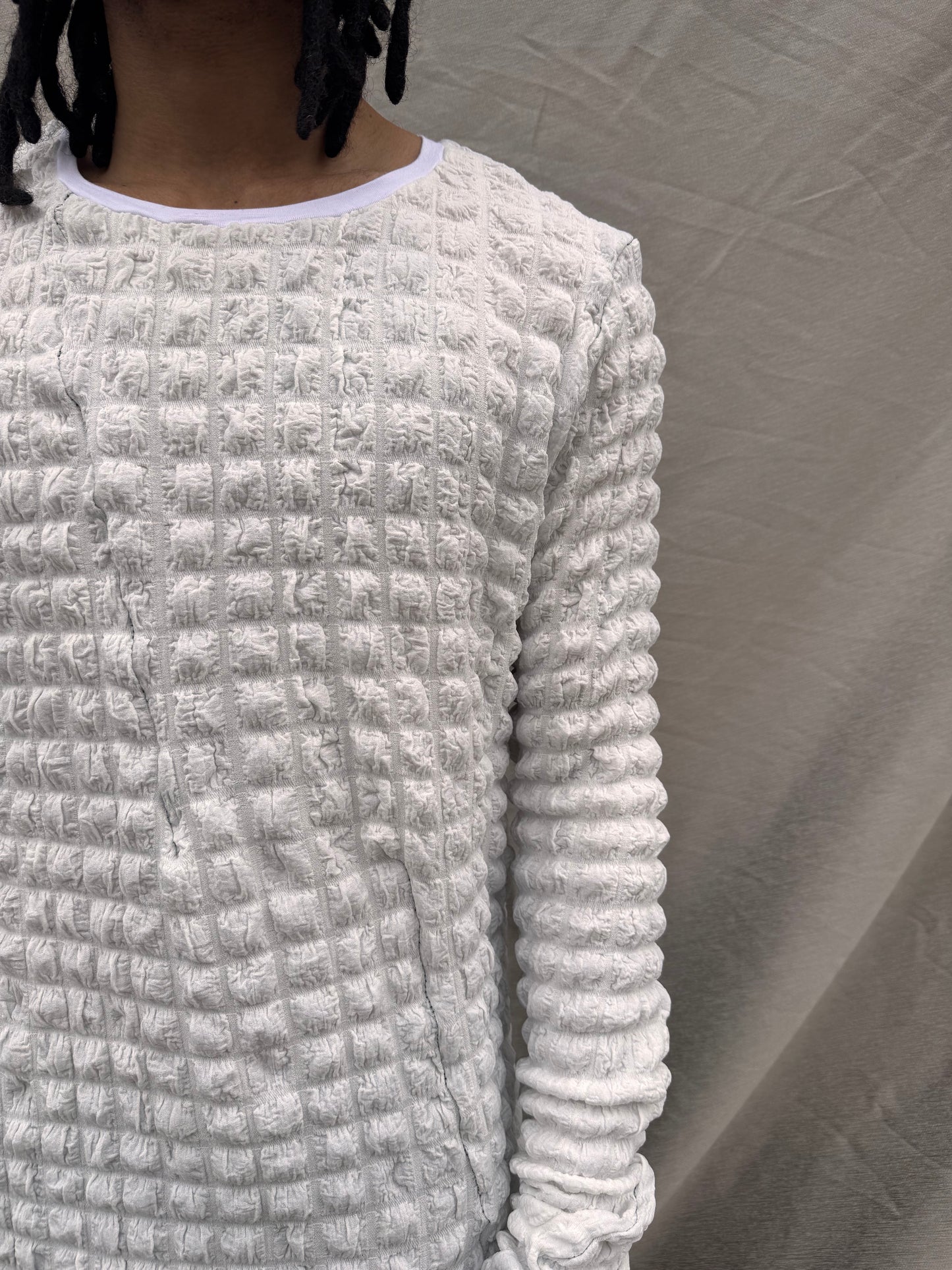 SS25 || OVERLOCKED PRIMORIDAL BUBBLE TEE || WHITE