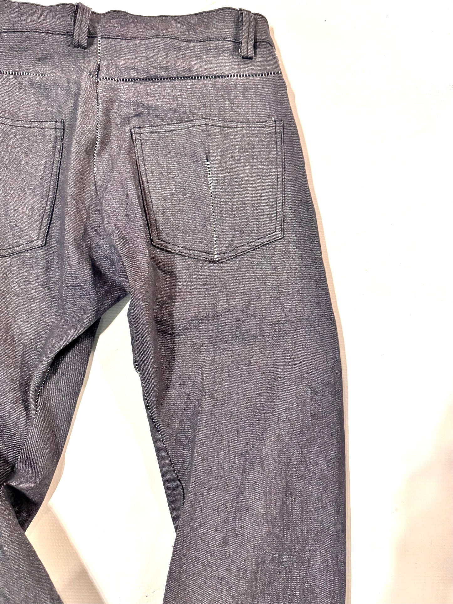 FW25 || BOOT CUT OVERLOCKED DNA JEANS ||GREY