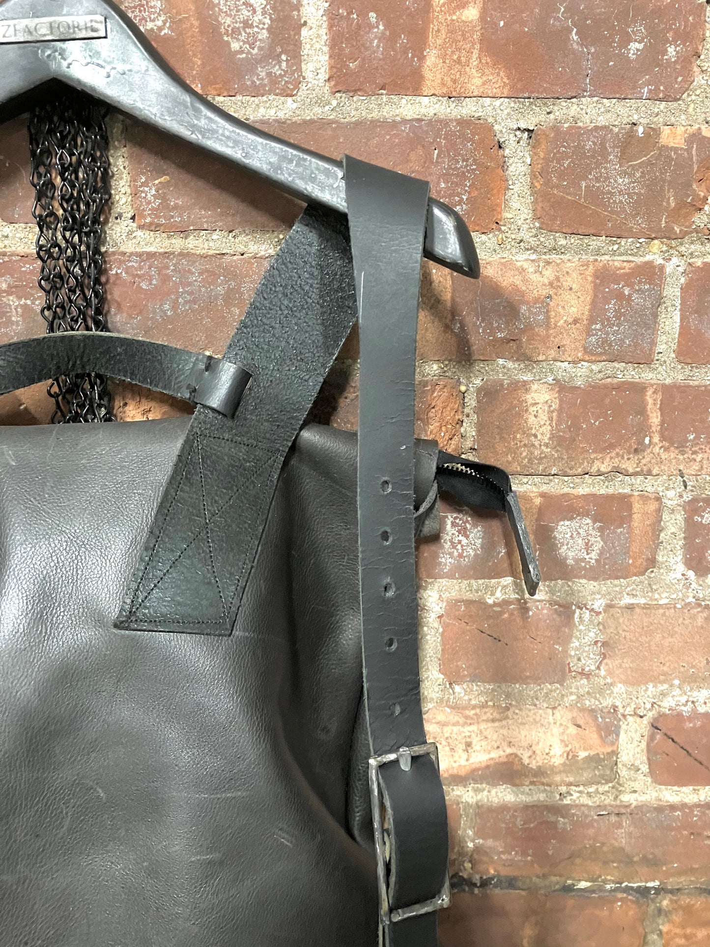 SS23 SLIM PROFILE BACKPACK - BLACK COWHIDE